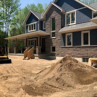 Spreading Topsoil for Dennison Homes